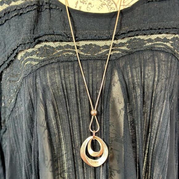 Gold Waterdrop Brushed Pendant on a Gold Rope Chain - Picture 12 of 13